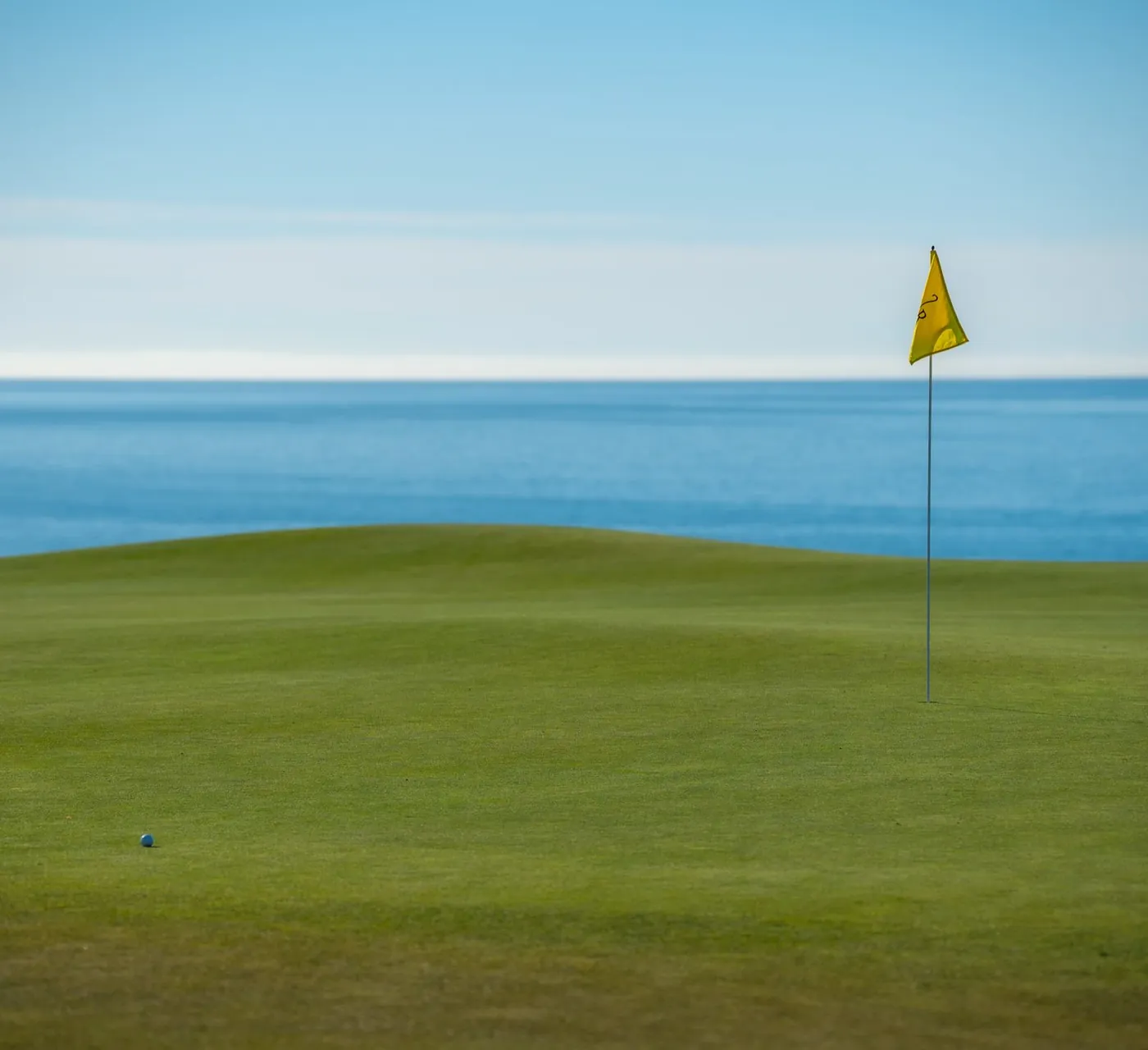 Coastal golf green overlooking the ocean