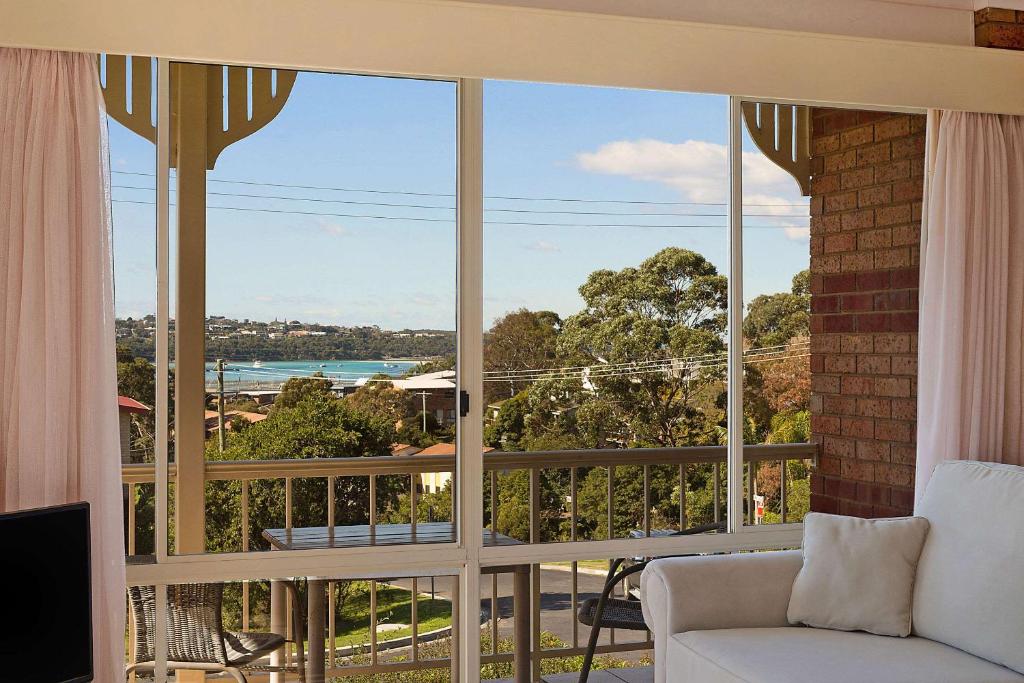 View of Merimbula Lake and town from a guest room balcony